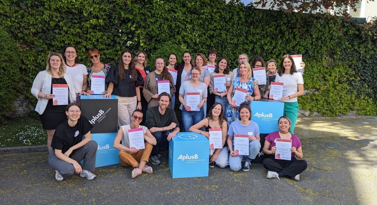 The Female Empowerment Workshop Series cohort celebrating with their certificates